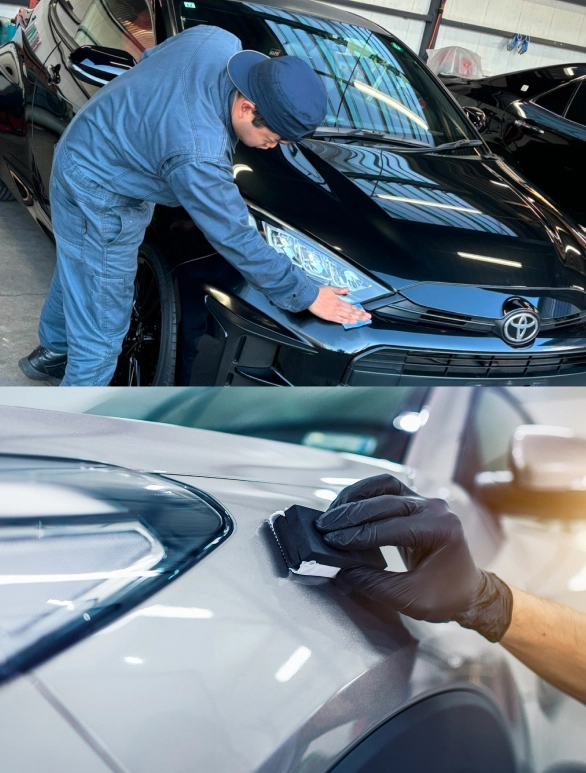 シルバーカラーの車を丁寧にコーディングする職人の写真